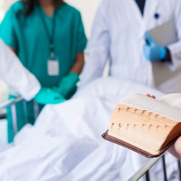 hospital-bible-chaplain-GettyImages-528134817-scaled
