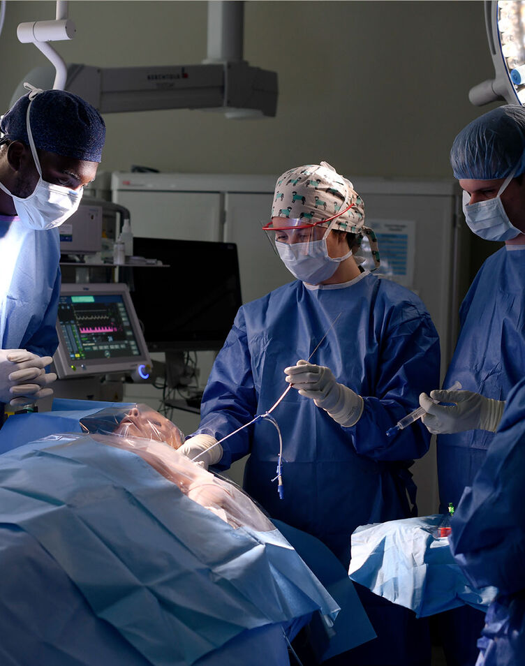 A group of nurse anesthesia students participate in an operating room simulation