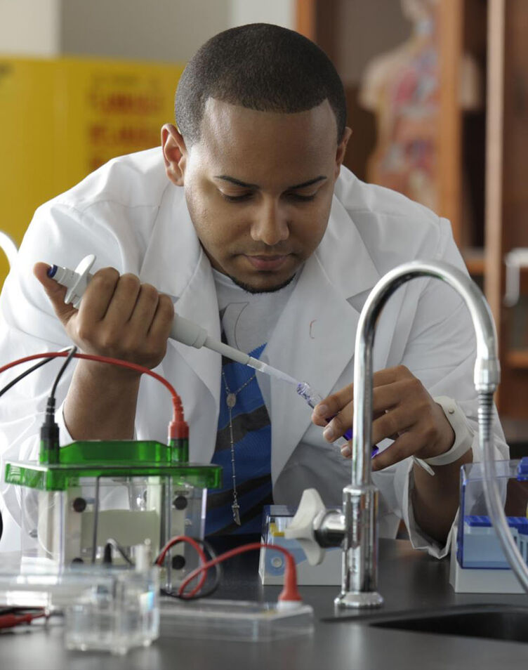 A student conducting a chemistry experiment